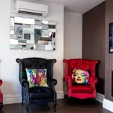 Velvet armchairs in the waiting room