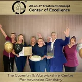 The team celebrating the Centre of Excellence award